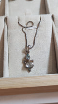 Silver necklace with topaz and moonstone