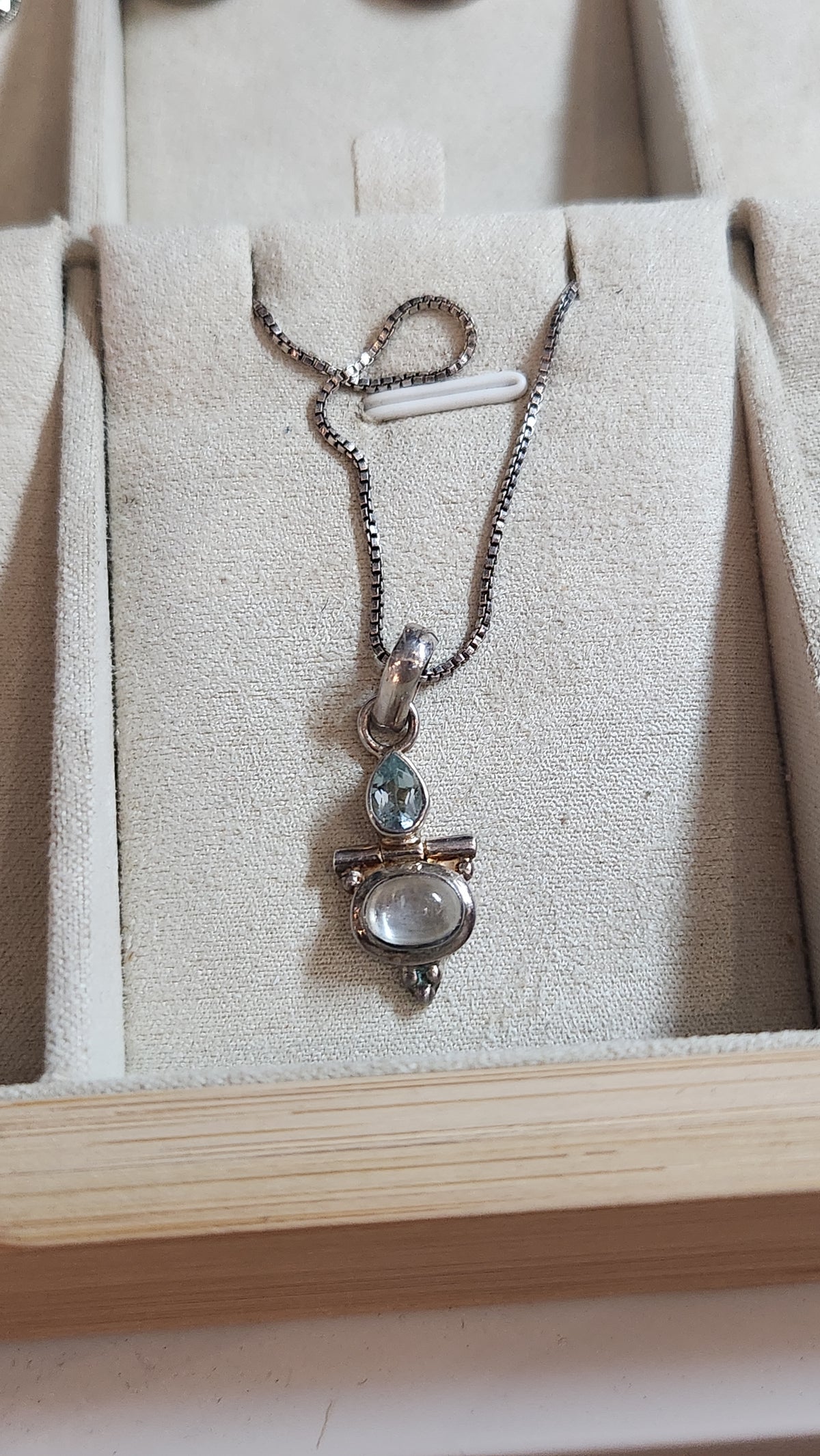 Silver necklace with topaz and moonstone